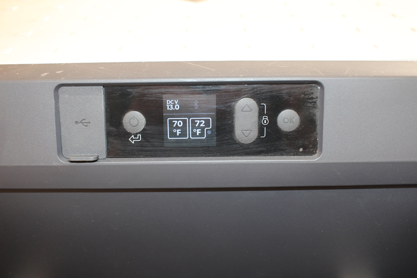 RV rental control panel shows 13.0V, Bluetooth, and temperature settings (70°F, 72°F). A USB port is also visible on the left.