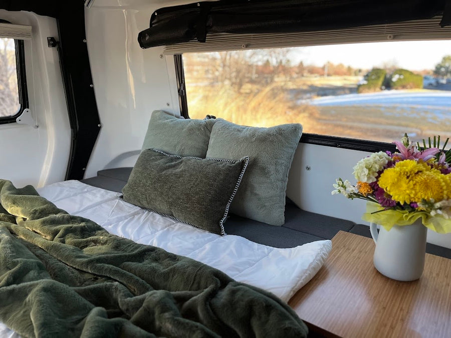 and an evening view. Perfect camper.|Relaxing RV rental interior: wine