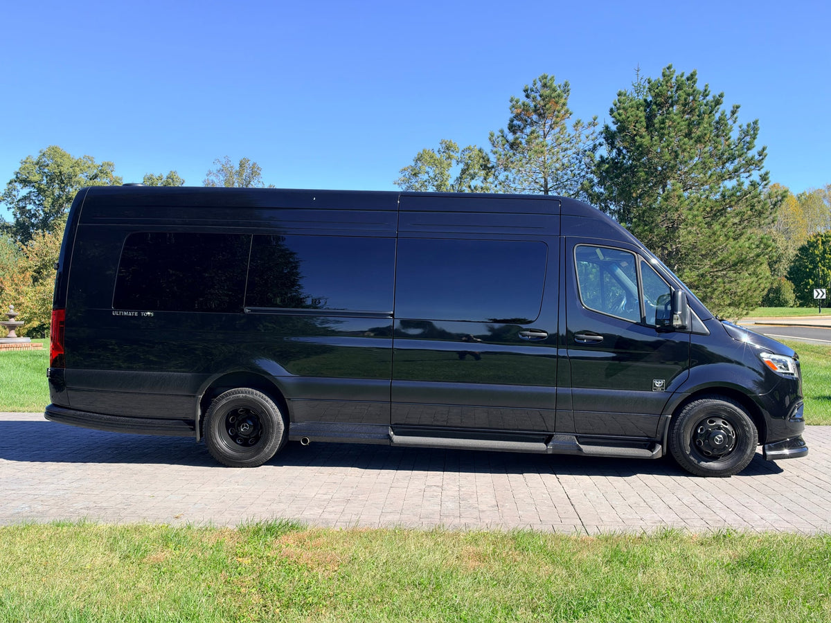Black "Ultimate Toys" luxury Mercedes Sprinter van — photo 1