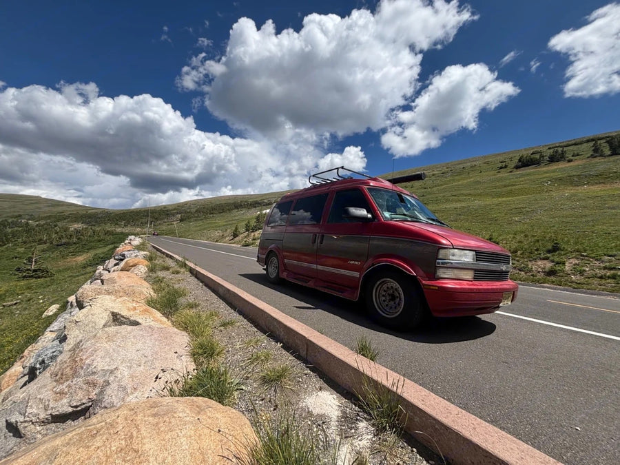 Red van with a roof rack
