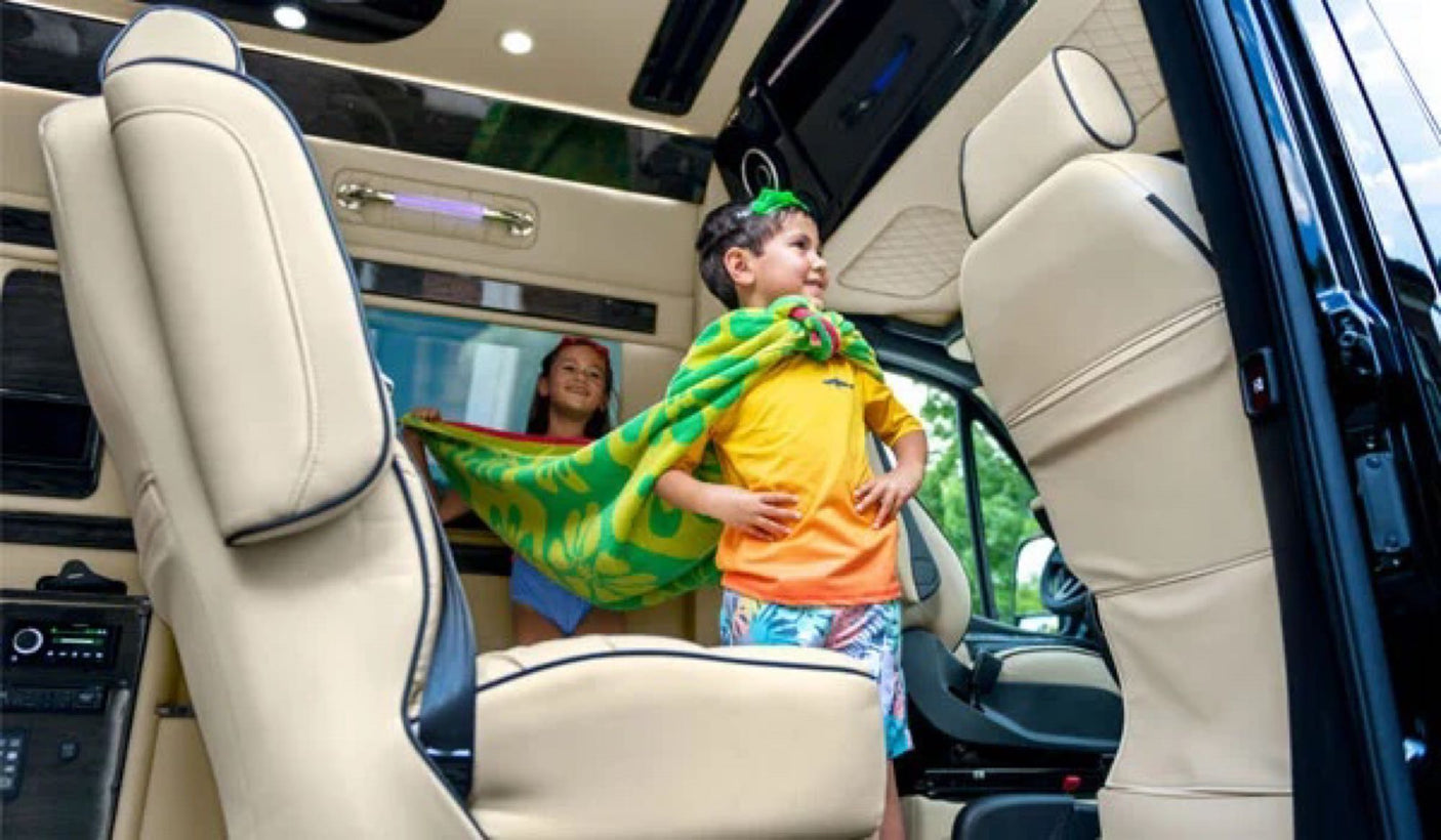 viewed from the rear.|Compare RV rental interior dimensions: standard 29-31" vs. Ultimate Toys' 44" for more spacious & comfortable designs.|This RV rental interior layout shows front seats