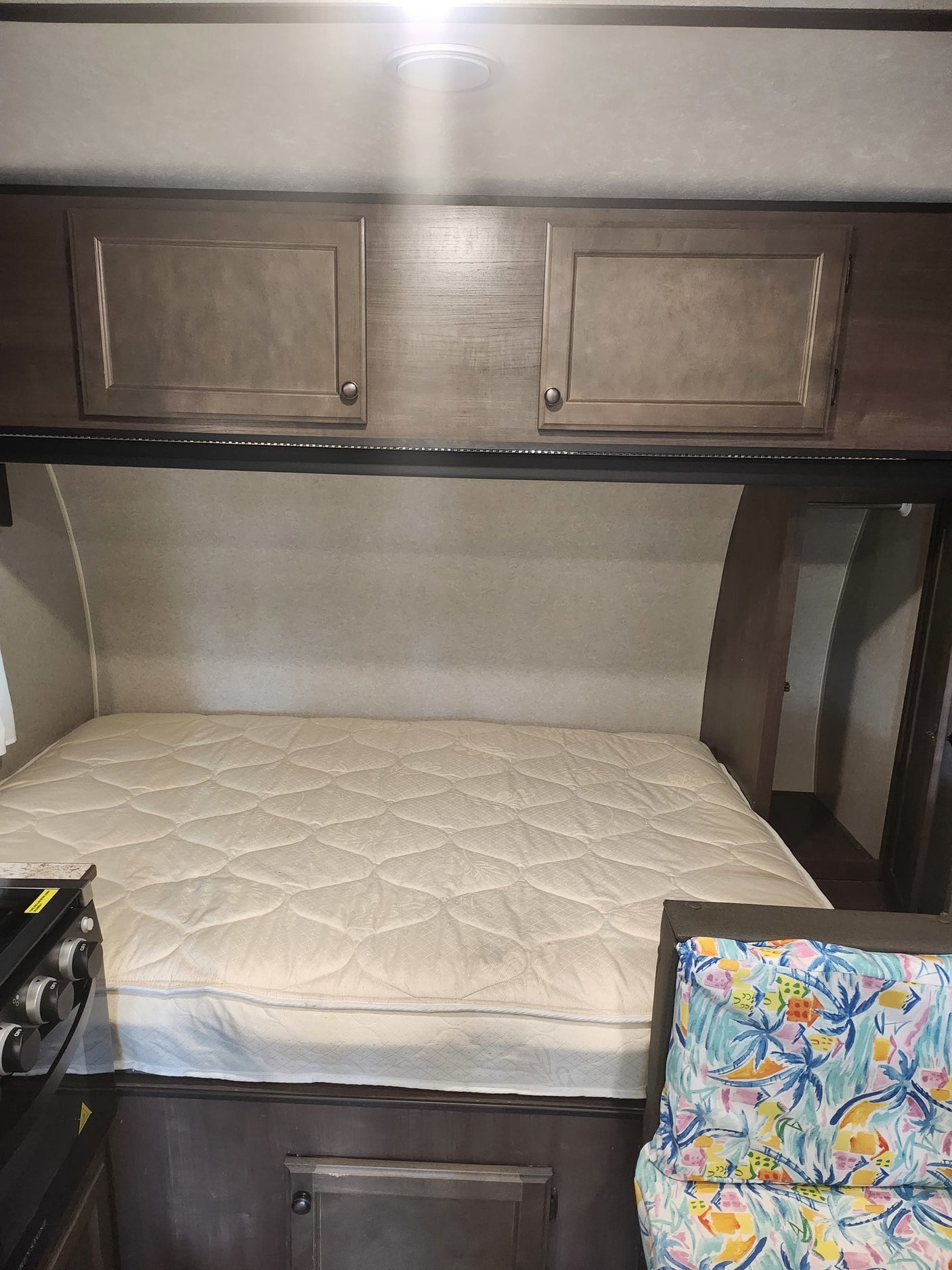 and microwave above a tiled backsplash. Ideal for camper travel.|Perfect for your next adventure: an **RV rental** with an extended awning