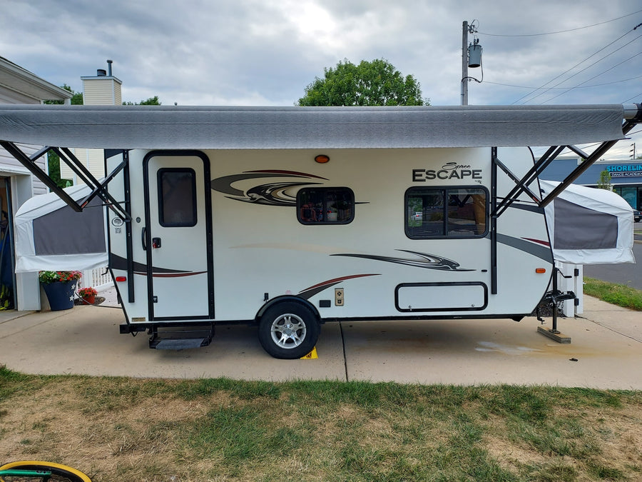 White Spree Escape pop-up RV rental with extended awning