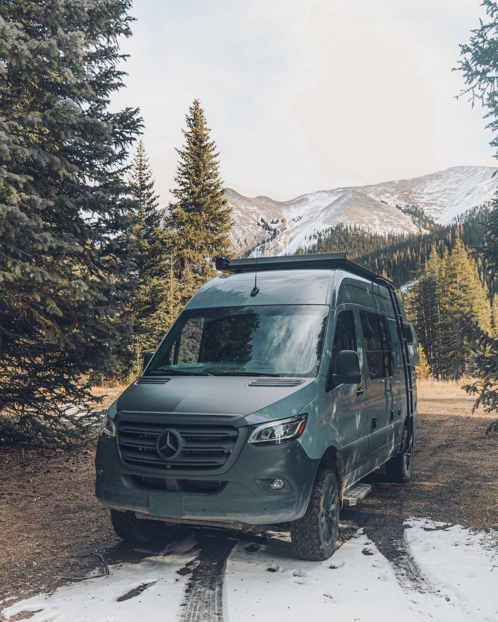 A sleek Mercedes-Benz Sprinter adventure van