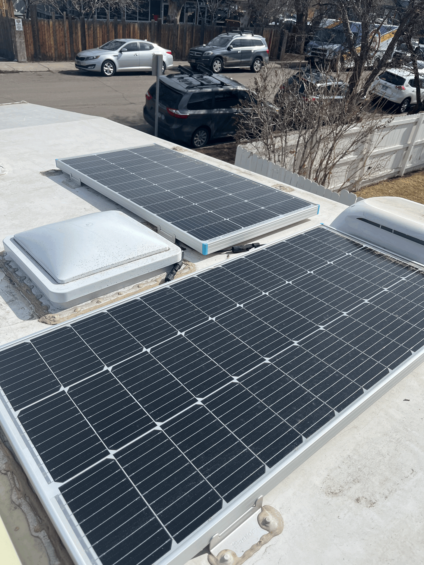 RV rental equipped with rooftop solar panels & vents, perfect for off-grid adventures.