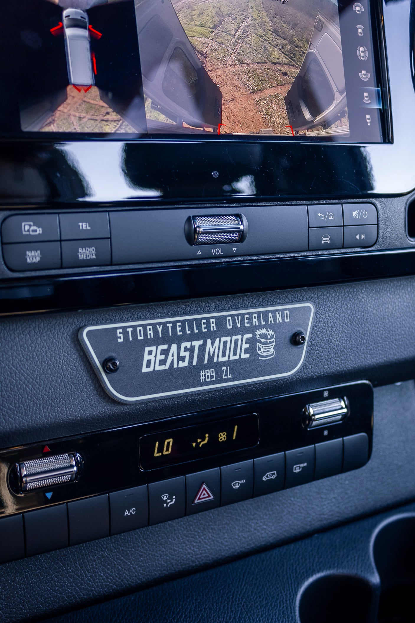 Adventure RV rental van dashboard featuring 360 camera view, infotainment, and "Beast Mode" controls.
