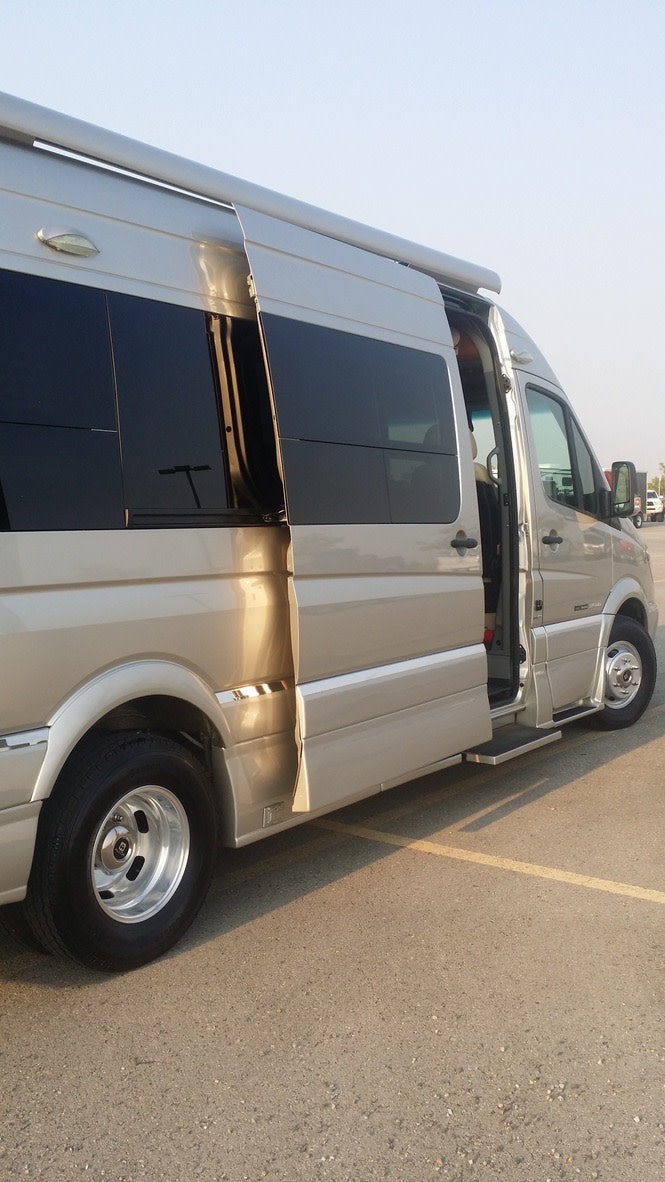 featuring tinted windows and cargo box