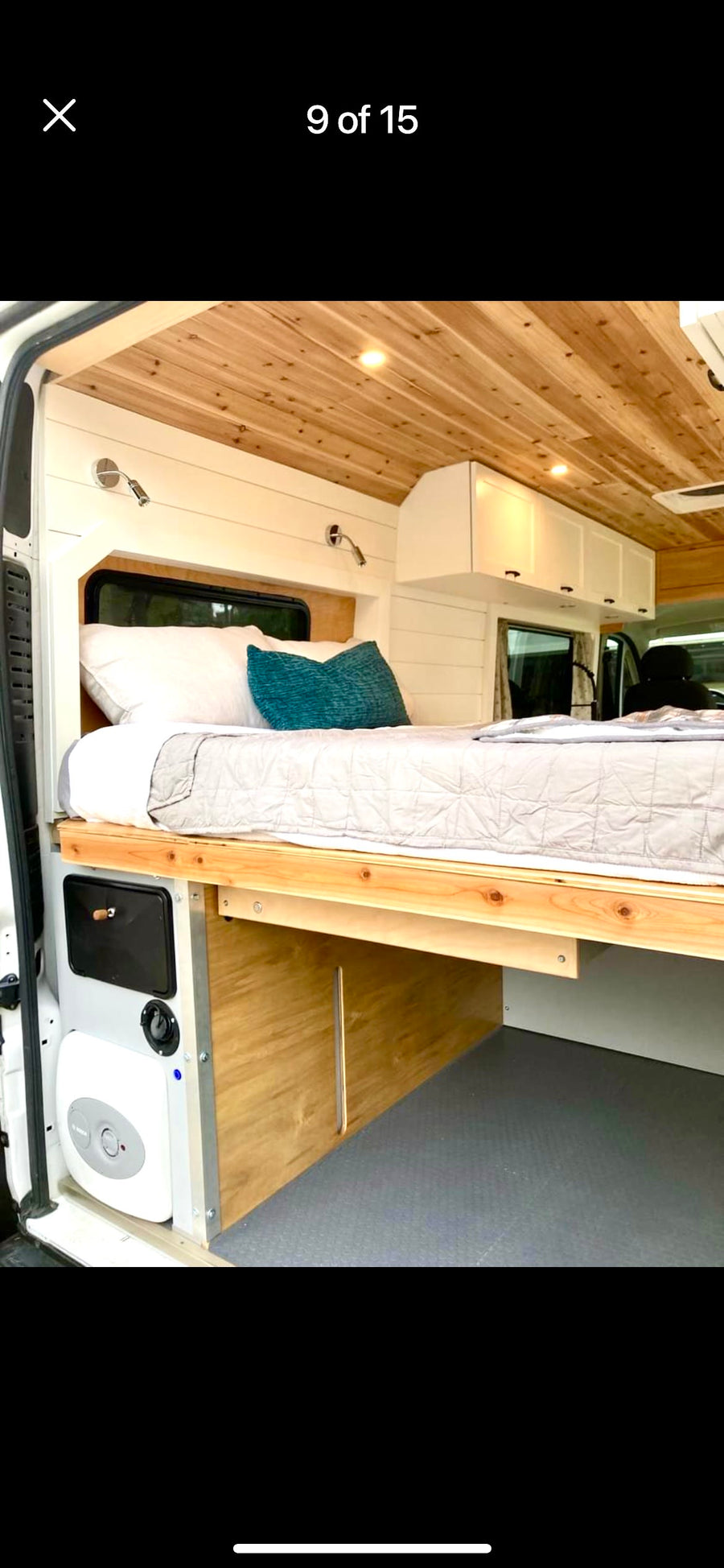 & spacious living area in a camper van.|White Ram ProMaster rv rental van on a paved lot with fallen leaves