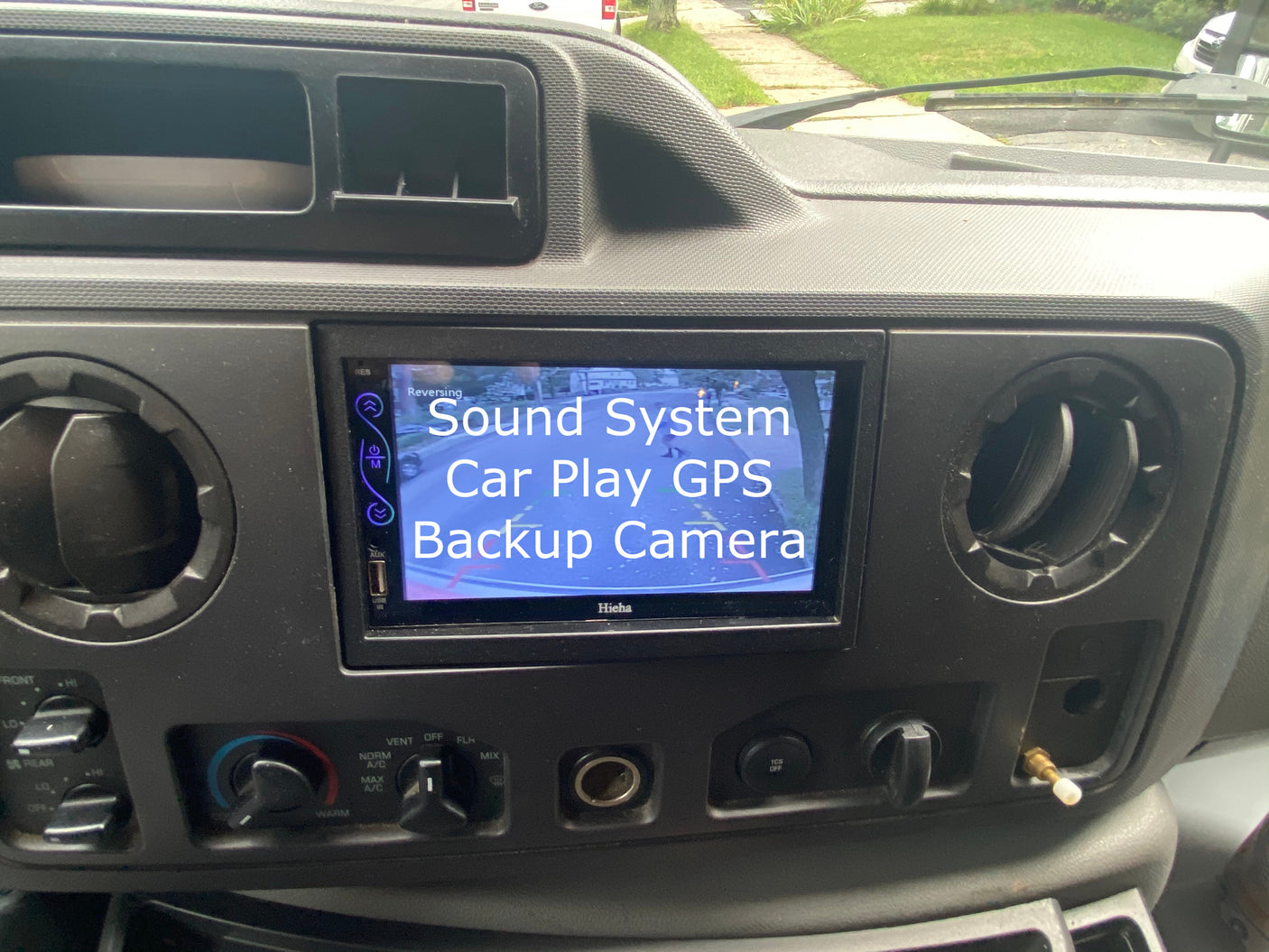 RV rental dashboard: Hieha infotainment system displaying active backup camera, GPS, and climate controls.
