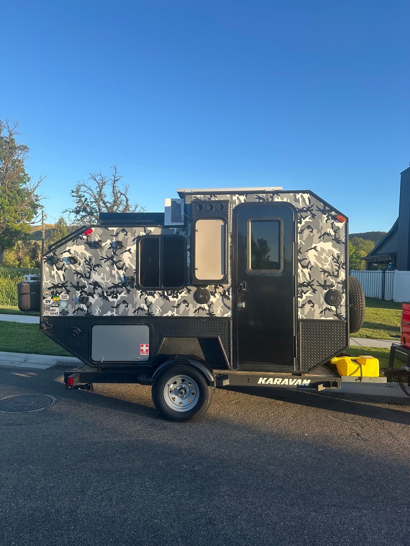 ideal for your next rv rental adventure.|Check out this unique camo Karavan off-road rv rental trailer — photo 2