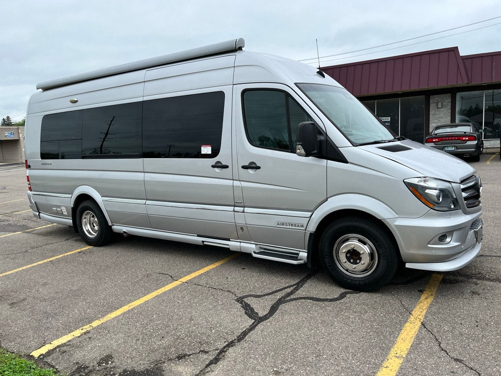 Silver Airstream Interstate RV rental van