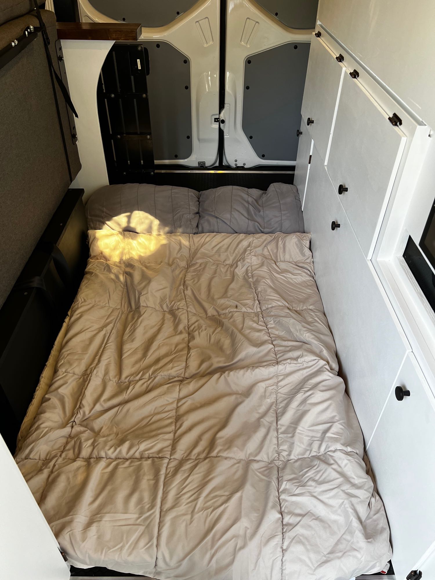 and cooktop.|Step inside this inviting rv rental van conversion