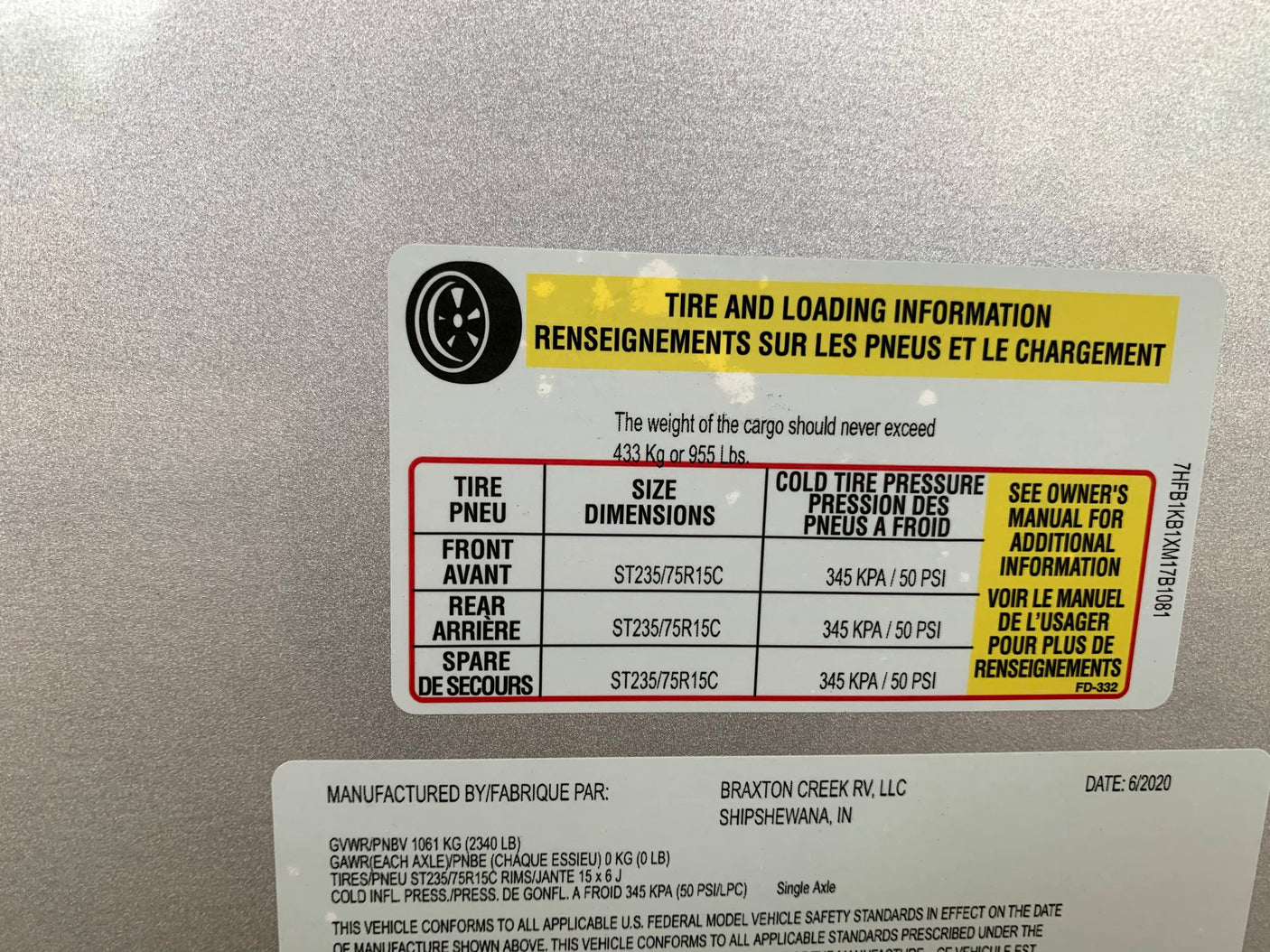 Essential tire and loading information for an RV rental, showing tire pressure (50 PSI), cargo capacity (955 lbs), and tire sizes.