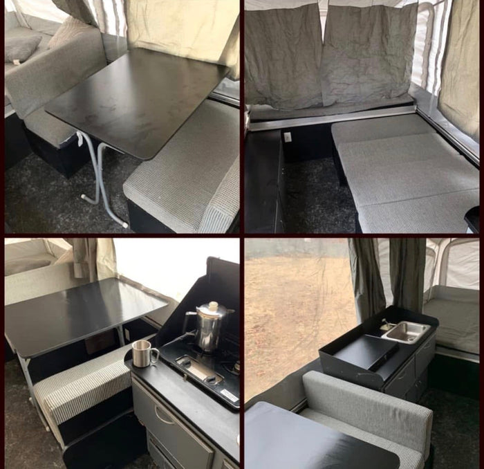 awning extended for a comfortable camping experience.|Fleetwood pop-up camper RV rental fully open