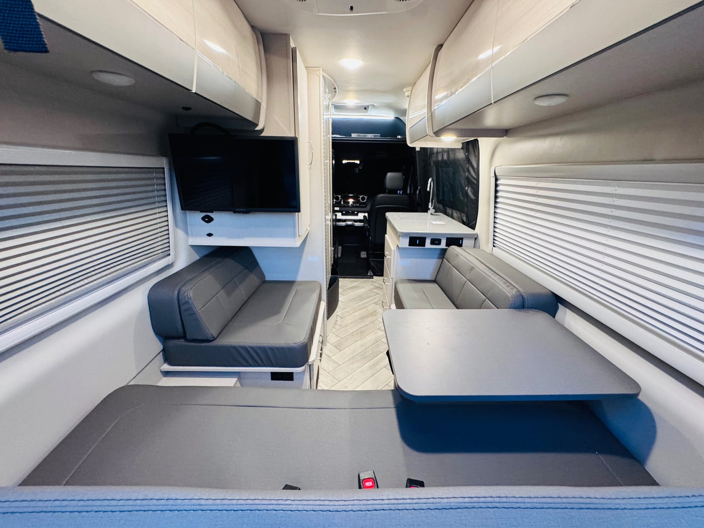 and extended awning.|Explore with this RV rental van! Features e-bikes — photo 14