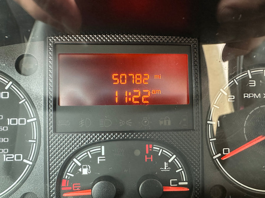 RV rental dashboard displays 50,782 miles and 11:22 AM. Speed, RPM, fuel, and temperature gauges are also visible.