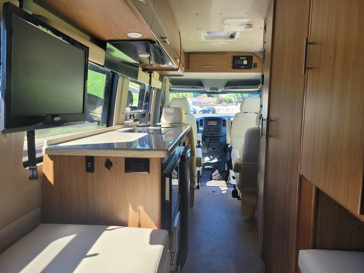 featuring a mounted Jensen TV — photo 14