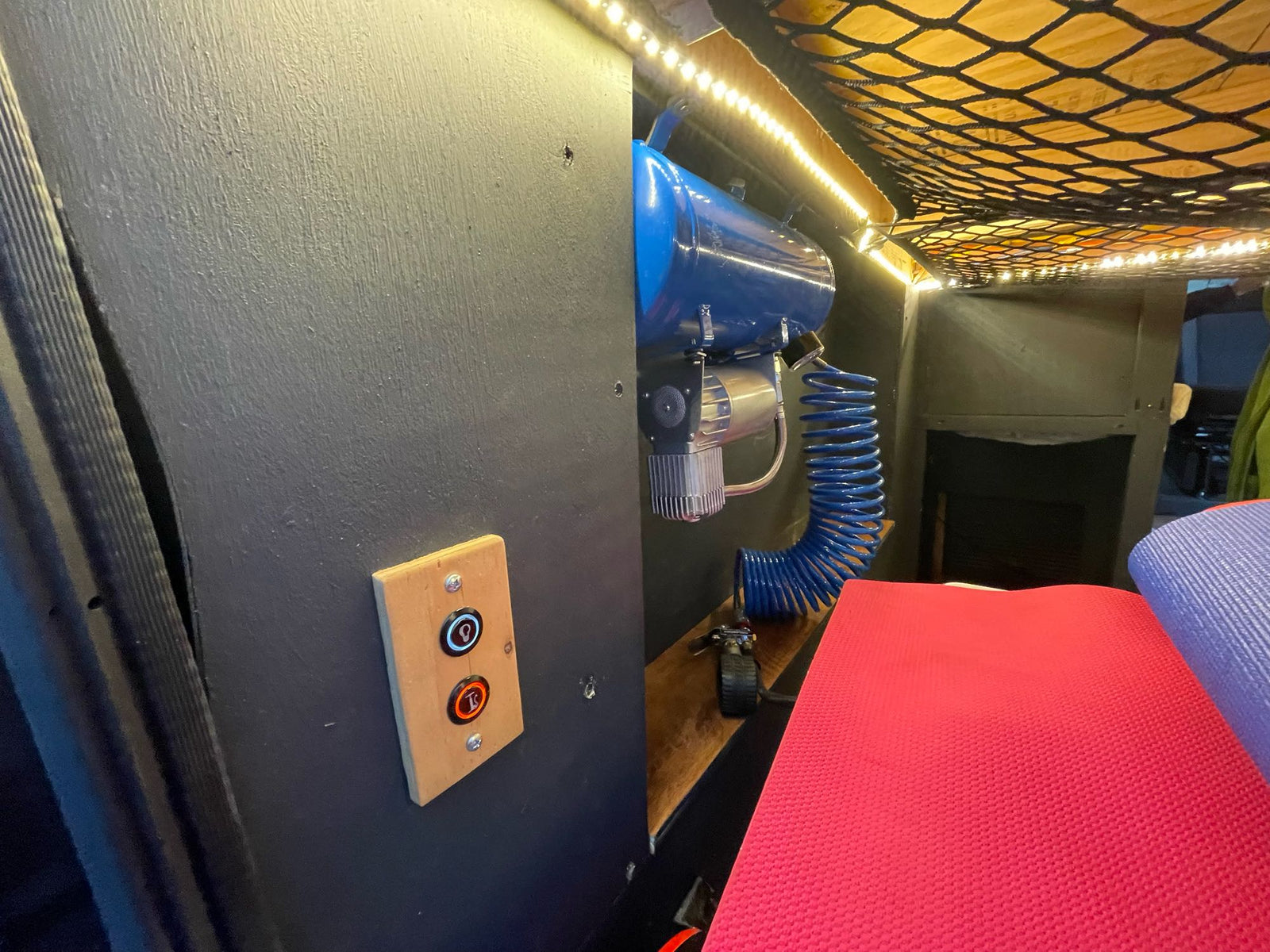 showcasing interior bed & bikes.|Stunning ocean sunset from an RV rental van