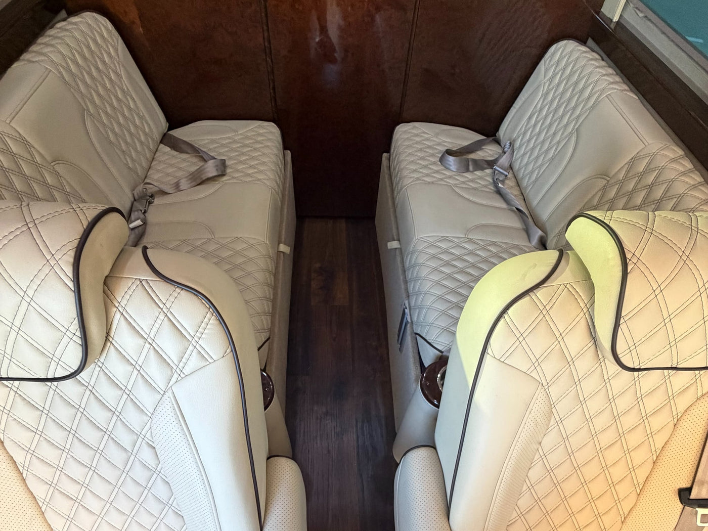 and rubber floor mats.|Elegant rv rental interior with cream-colored — photo 7