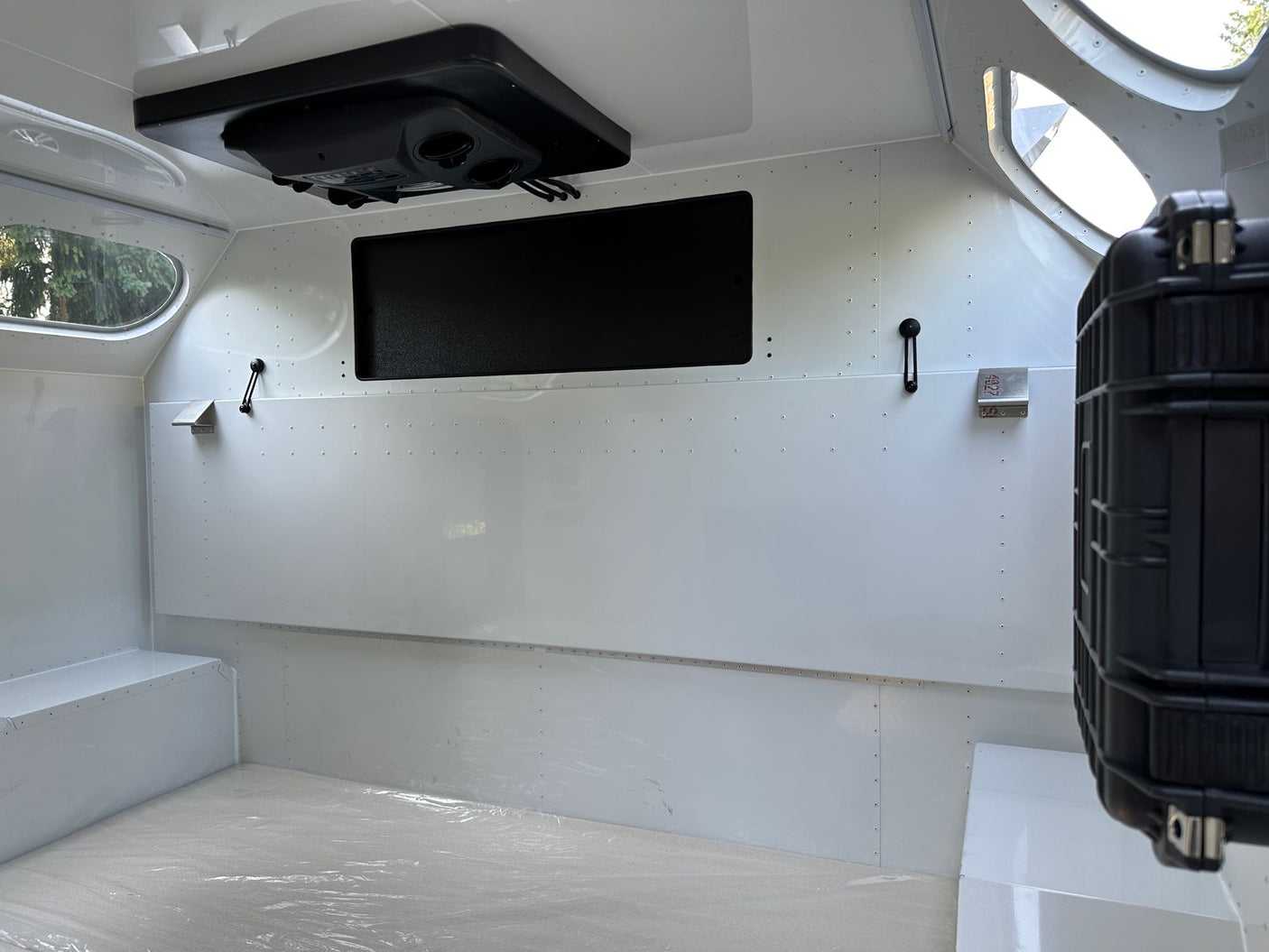 ideal for trips.|Brightly lit rv rental camper with an extended outdoor kitchen: cooler