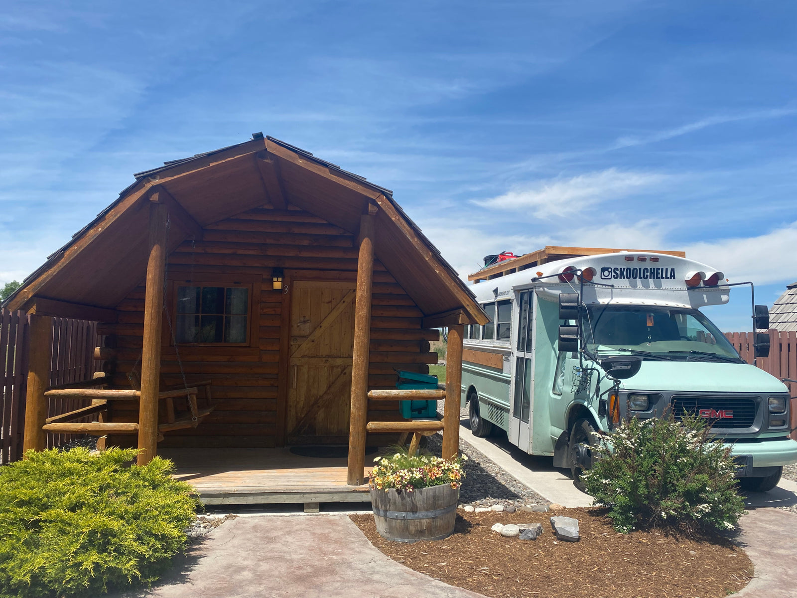 Rustic log cabin & a "Skoolchella" converted bus, an excellent RV rental for unique glamping.