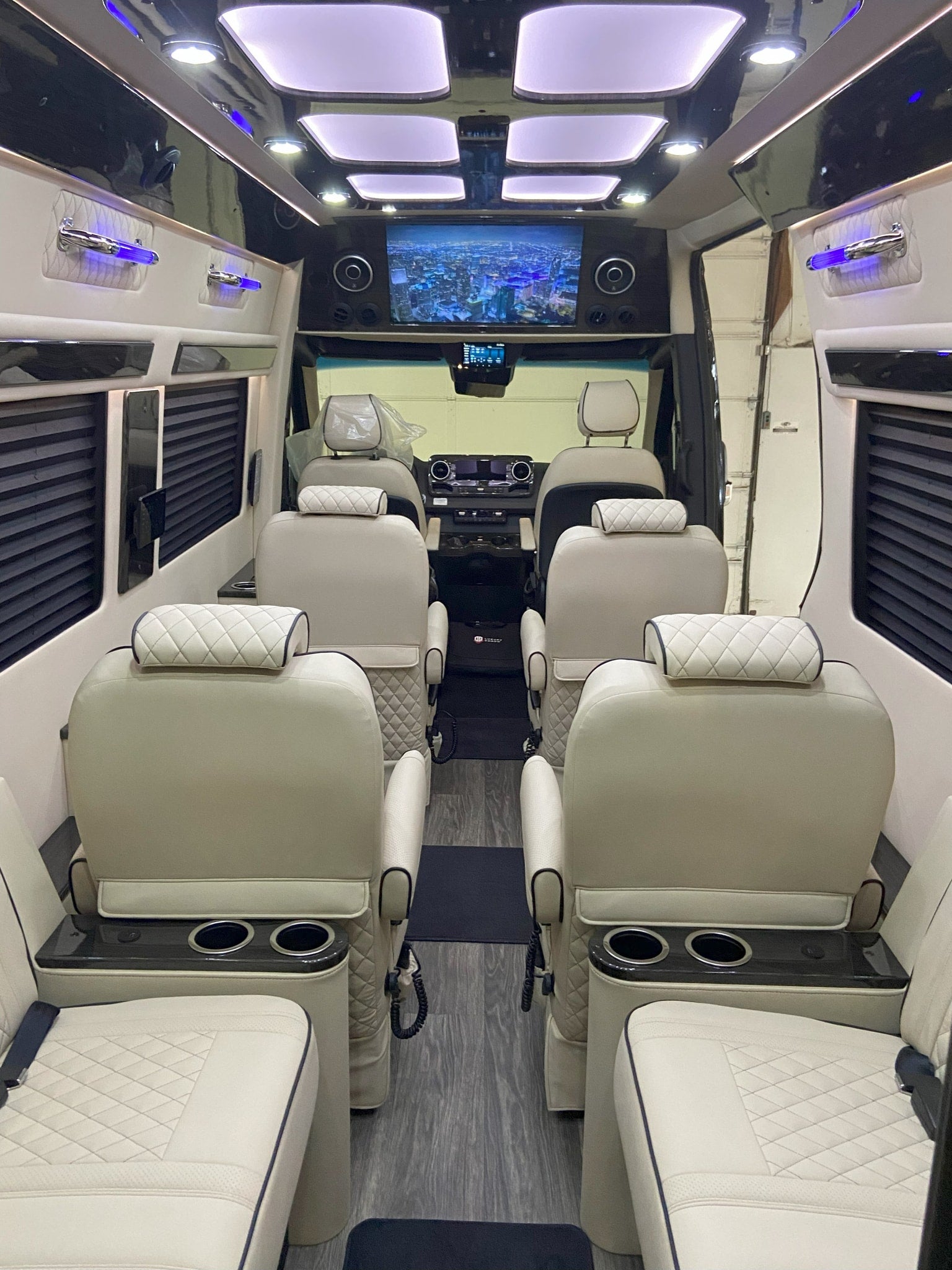ready for your next rv rental adventure.|Luxurious RV rental interior with plush quilted cream seats
