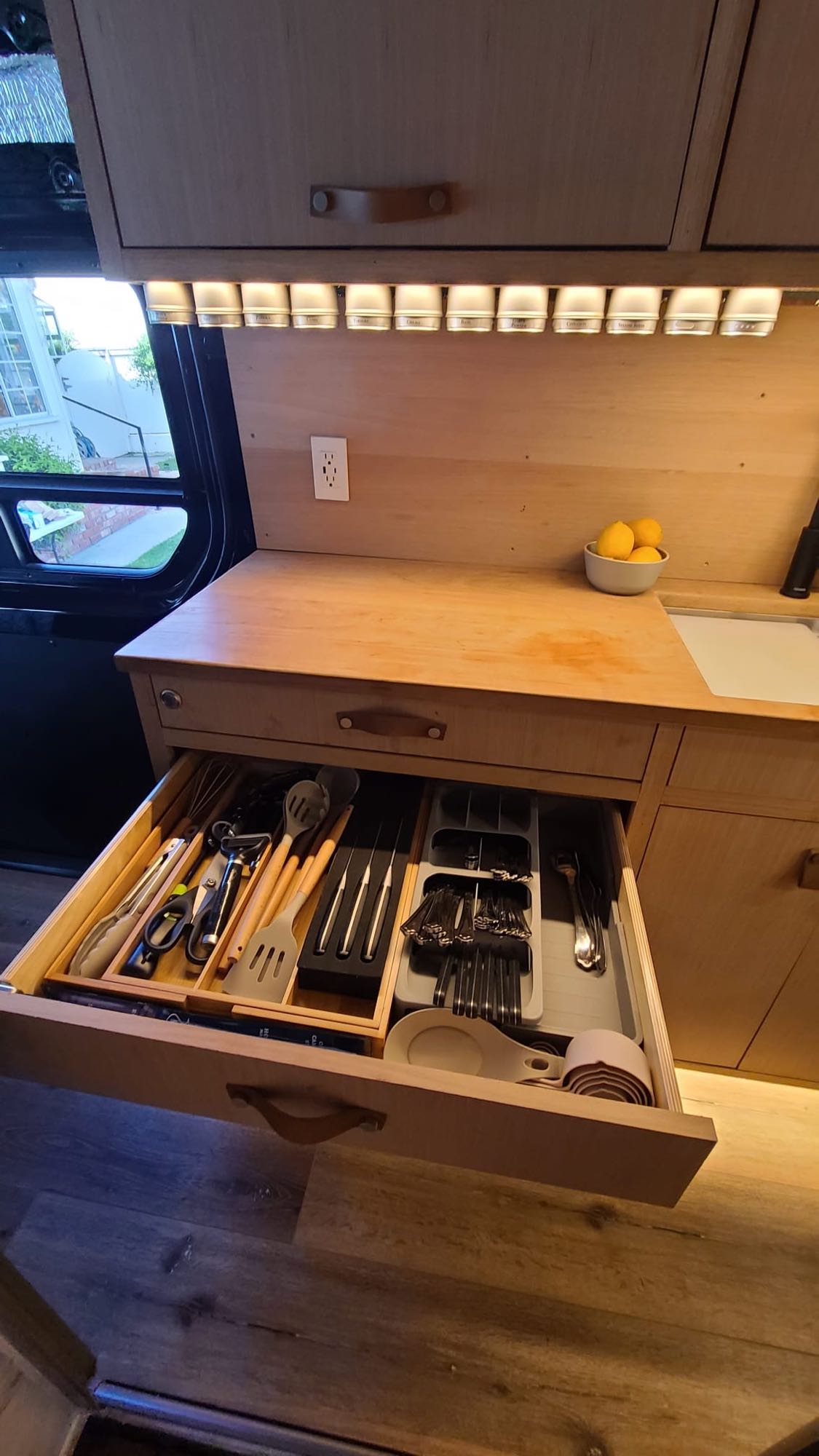 perfect for camper van adventures & van life!|This RV rental features a white composting toilet — photo 11