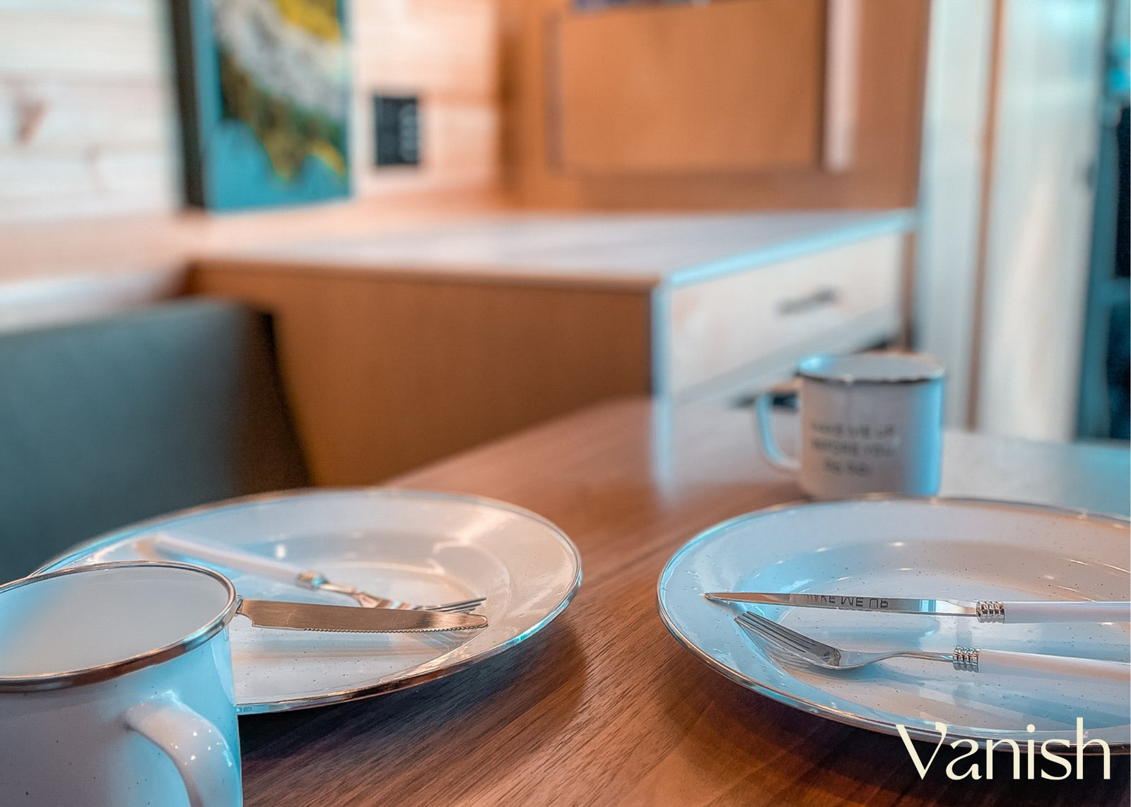 and coffee filters. Essential compact travel setup.|Custom RV rental interior: cozy bed