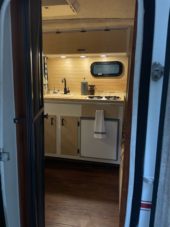 and flowers for a peaceful outdoor escape.|Inside a bright RV rental