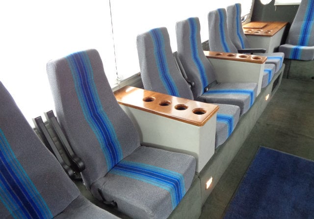 featuring a comfortable lounge setup with striped seats — photo 4