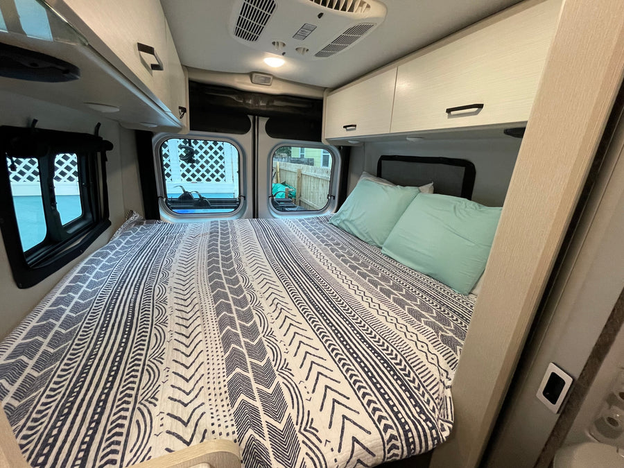 and essentials like a fire extinguisher.|View inside a modern RV rental