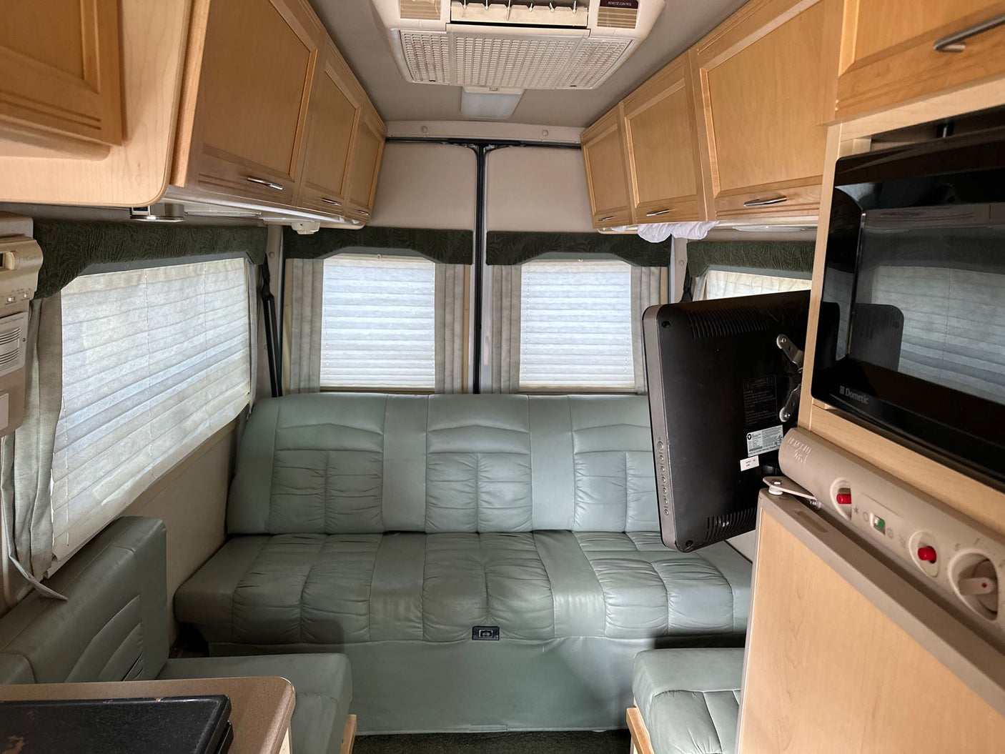 and handy spice rack.|RV rental: The rear interior features a versatile fold-down bed