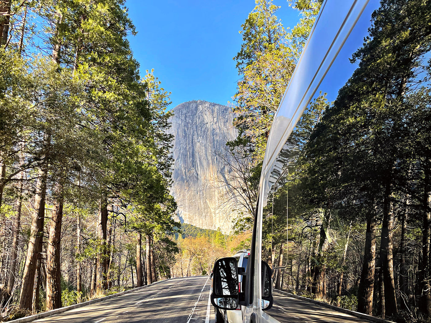 Scenic drive to El Capitan in Yosemite, captured with an RV rental reflection. Adventure awaits!