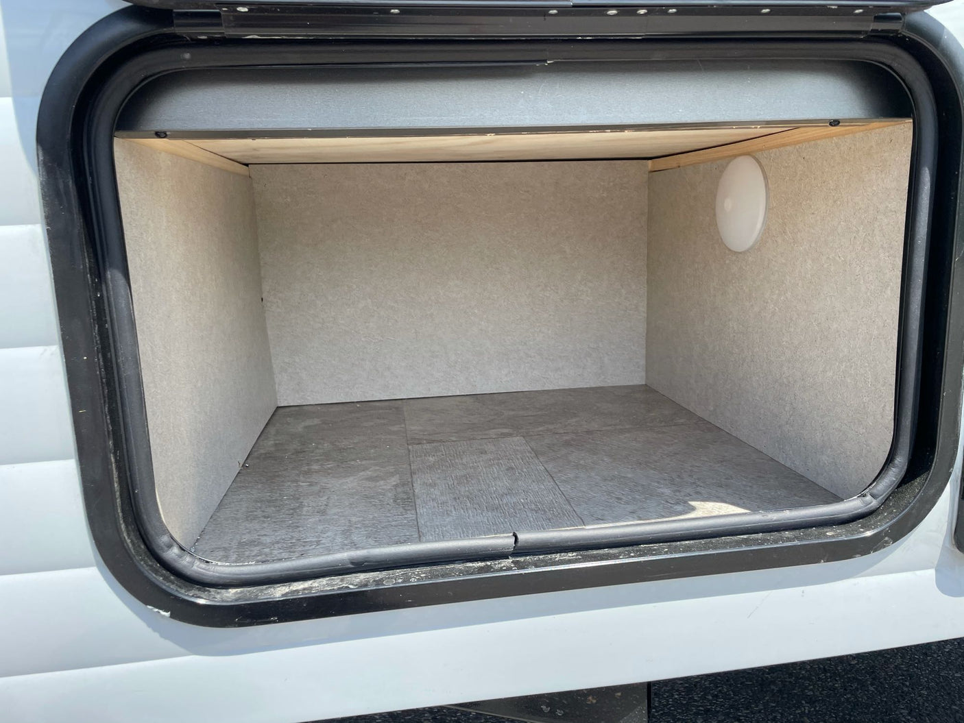 fridge. Ready for your adventure!|A rugged Kenda Klever M/T tire and custom wheel on an RV rental