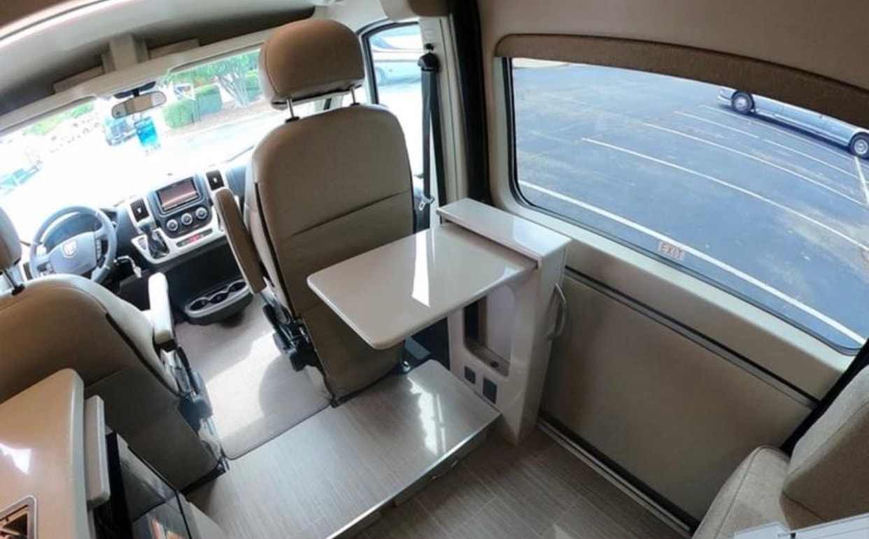 parked on pavement.|This RV rental Thor Sequence camper van is equipped with a bike rack