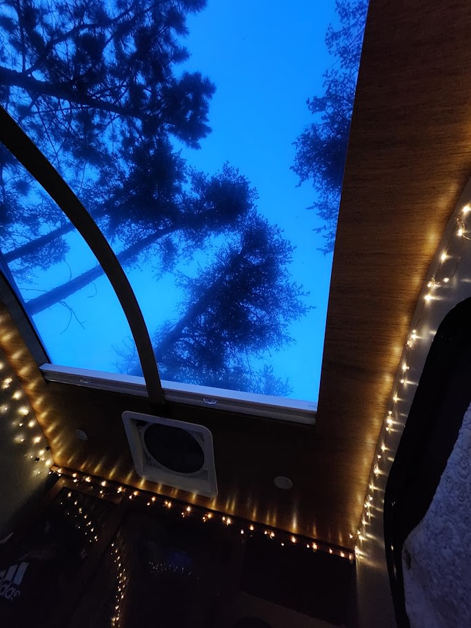 ready for your adventure.|RV rental interior: Plaid bed