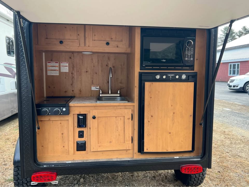 an off-road rv rental option ready for adventure.|Blue & white 2023 Sunray 109 travel trailer