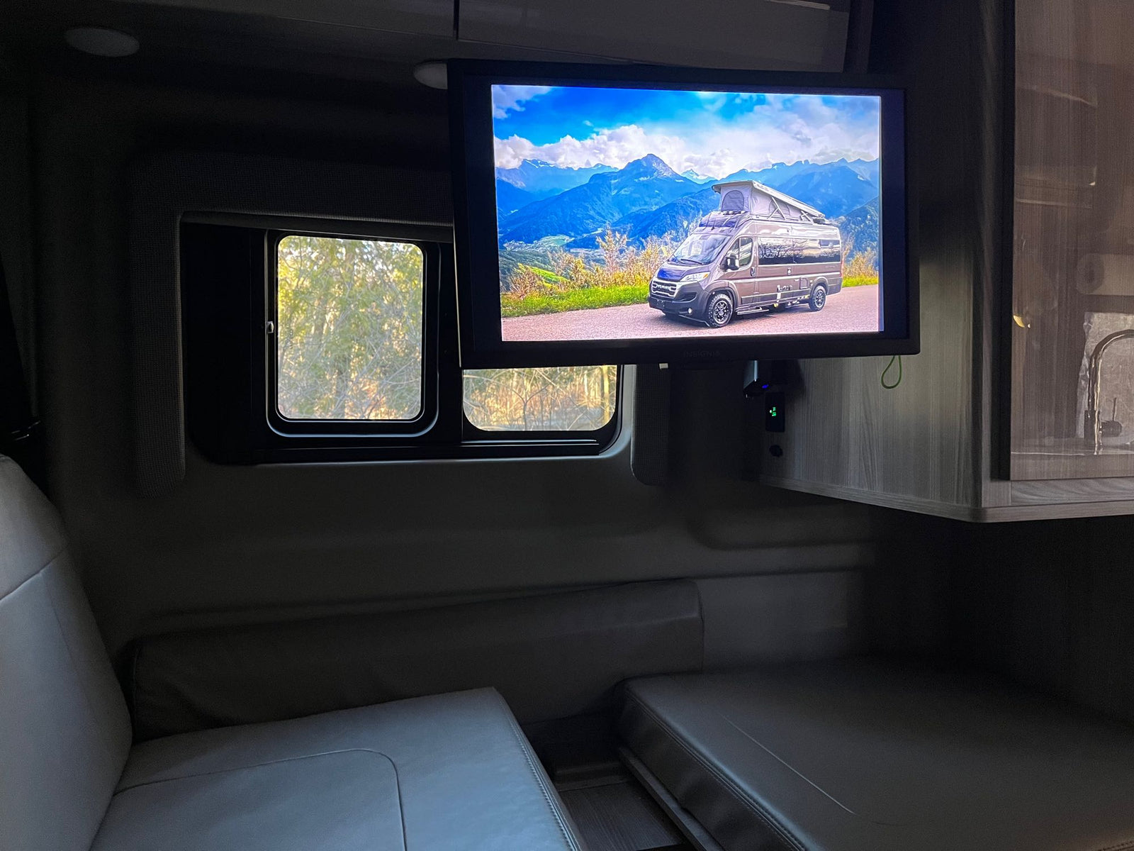and nature.|Spacious rv rental interior features a kitchen counter with fruit