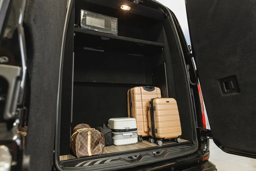 and custom window shades for ultimate comfort.|Plush RV rental interior: white quilted seating