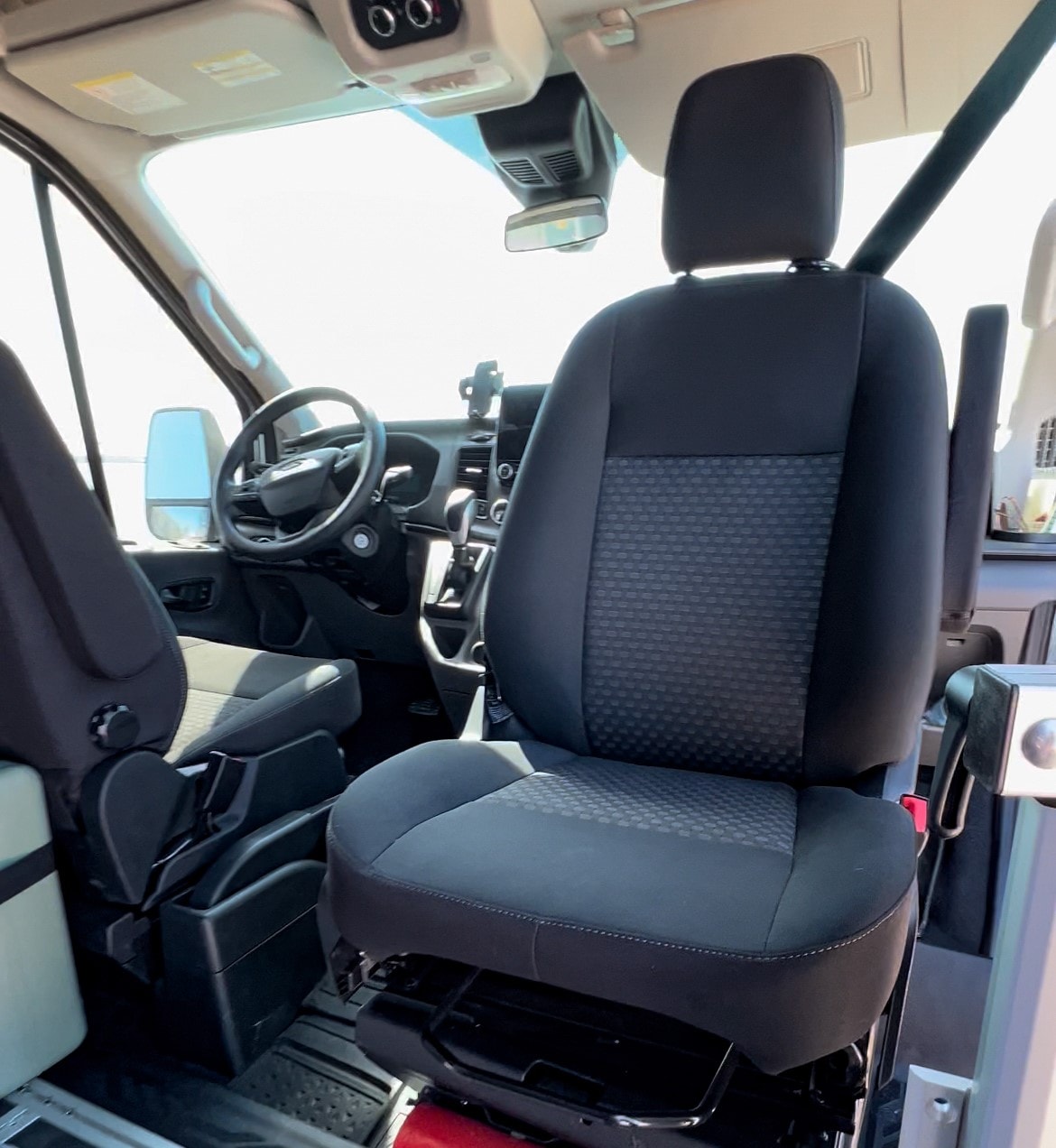 parked with bikes on back & awning out. Ready for adventure!|Modern RV rental interior with blue lights