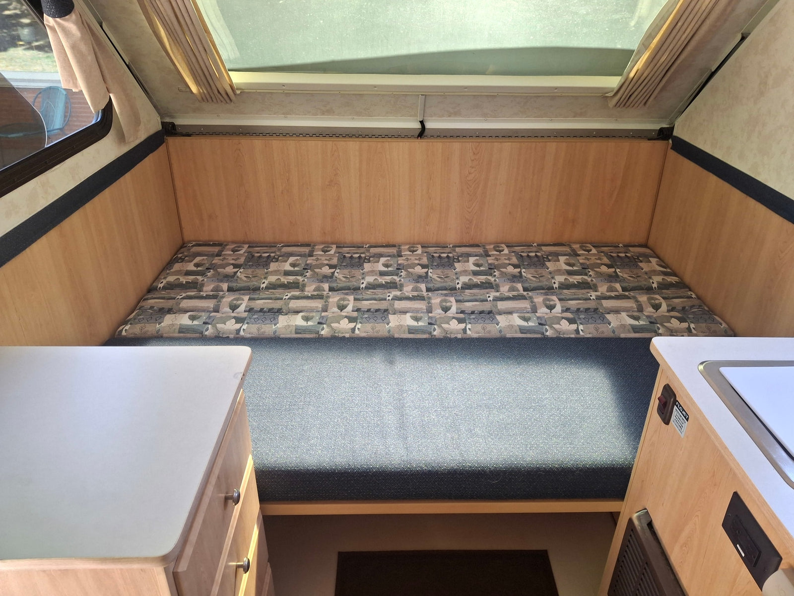 featuring a compact kitchen with sink