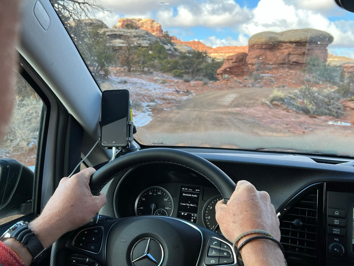 forested area. This RV rental is ready for your next adventure.|A white Mercedes camper van — photo 1