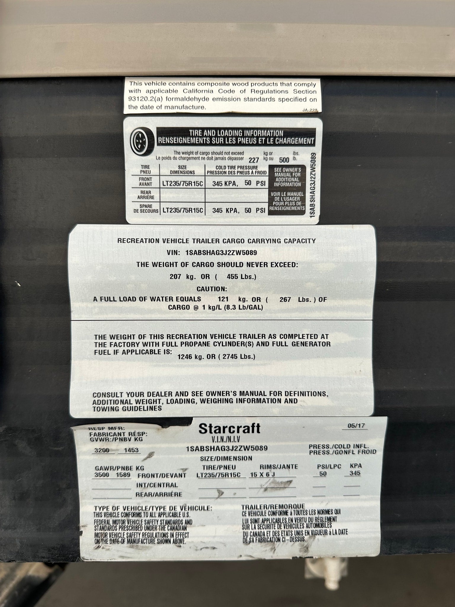 Starcraft RV rental trailer safety label: VIN, tire pressure, and weight specifications. Crucial info for safe operation.