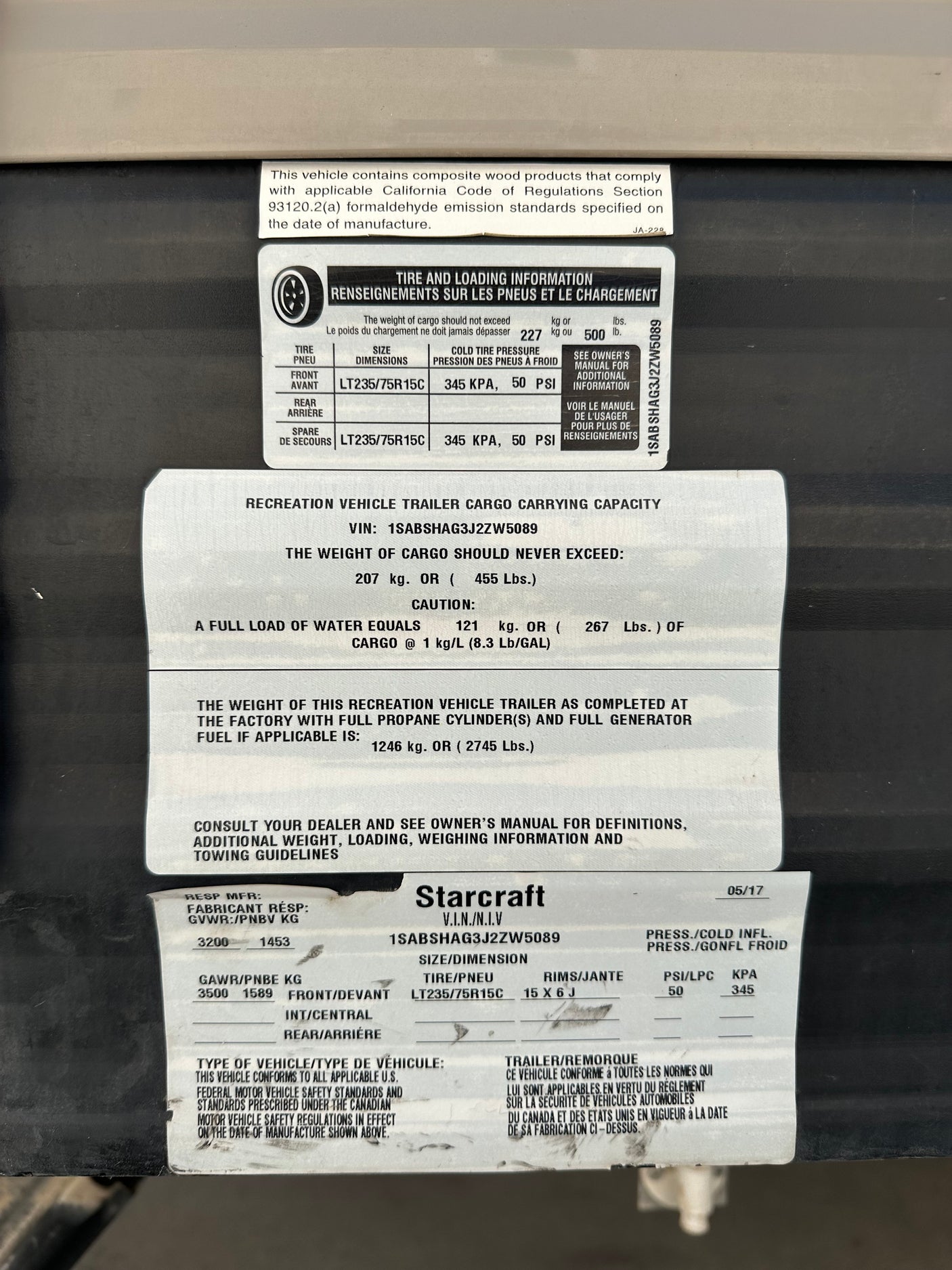 Starcraft RV rental trailer safety label: VIN, tire pressure, and weight specifications. Crucial info for safe operation.