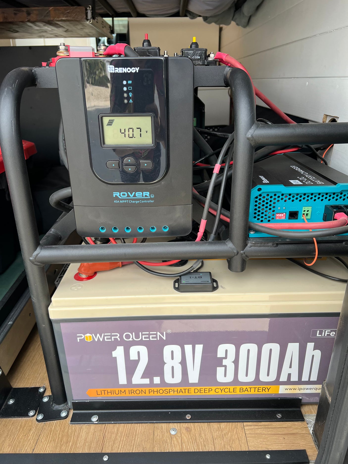 RV rental power setup: Renogy solar charge controller, DC-DC charger, & 300Ah LiFePO4 battery provide off-grid power.