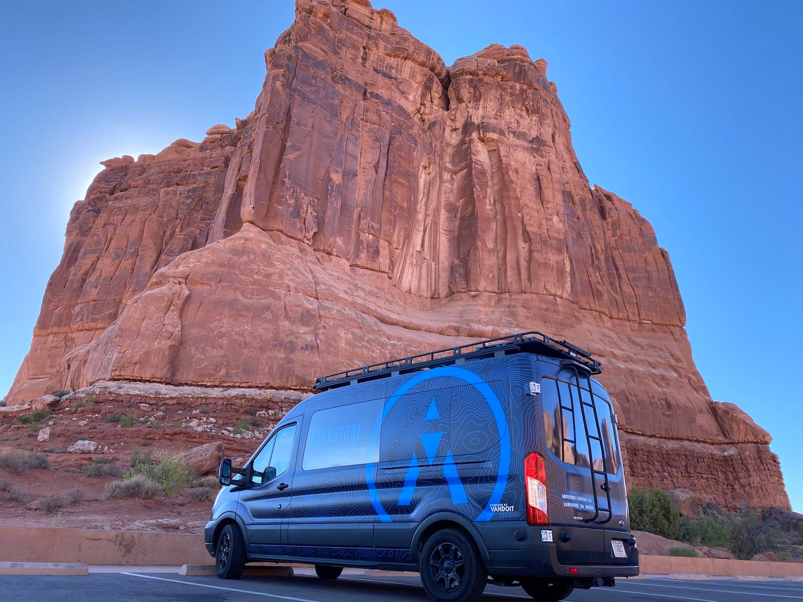 This dark blue RV rental van