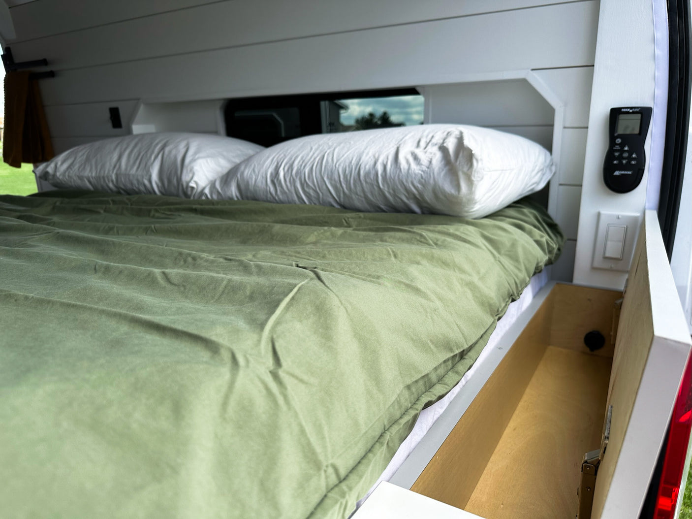 and functional kitchen with wood counters.|Explore this RV rental's cozy interior
