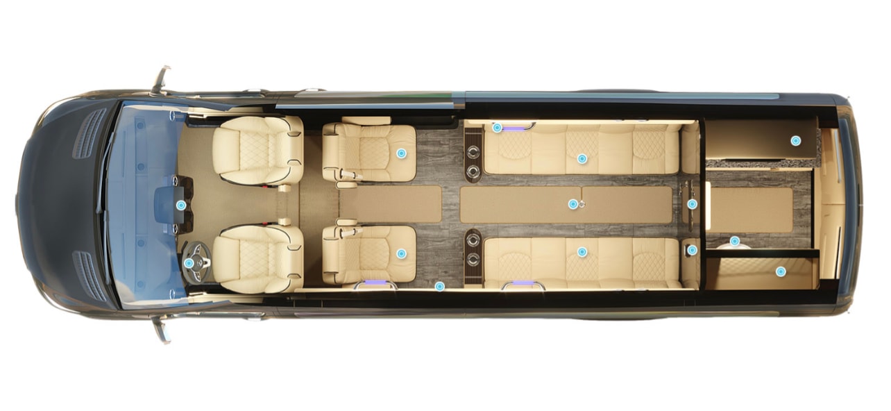 plush cream interior for travel.|RV rental: Overhead view of a luxury camper van interior with front seats