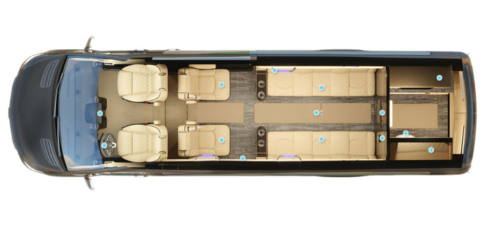 plush cream interior for travel.|RV rental: Overhead view of a luxury camper van interior with front seats
