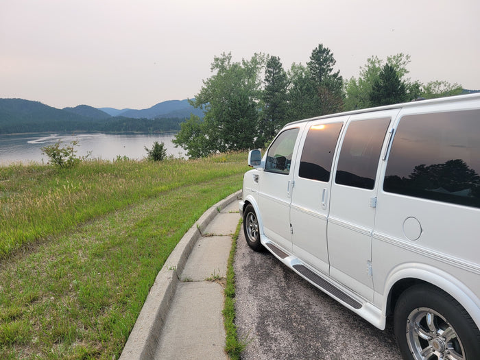 with plush tan leather seats and a full dashboard view